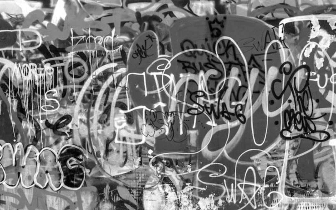 Black & white image of wall graffiti
