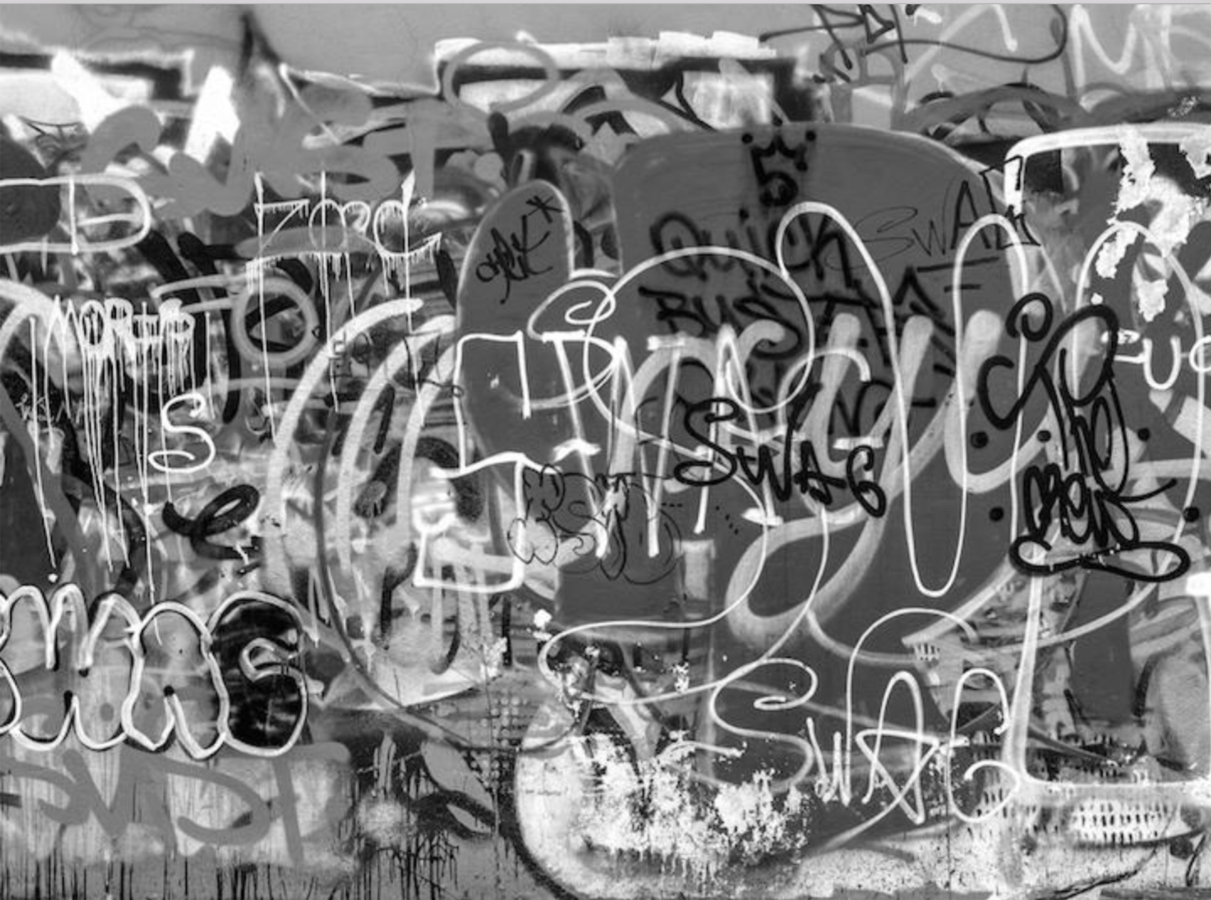 Black & white image of wall graffiti