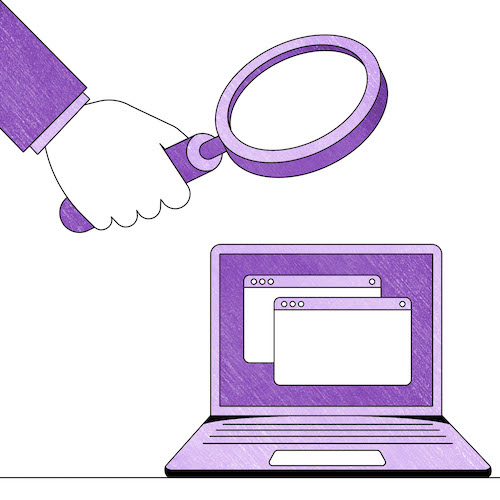 An image of a person holding a magnifying glass over a laptop.