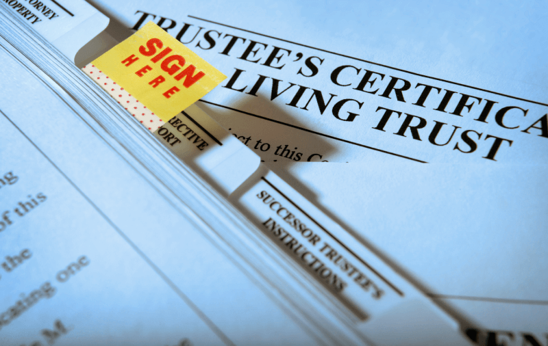 Certificado de fideicomisario Documentos de fideicomiso en vida con una pegatina 